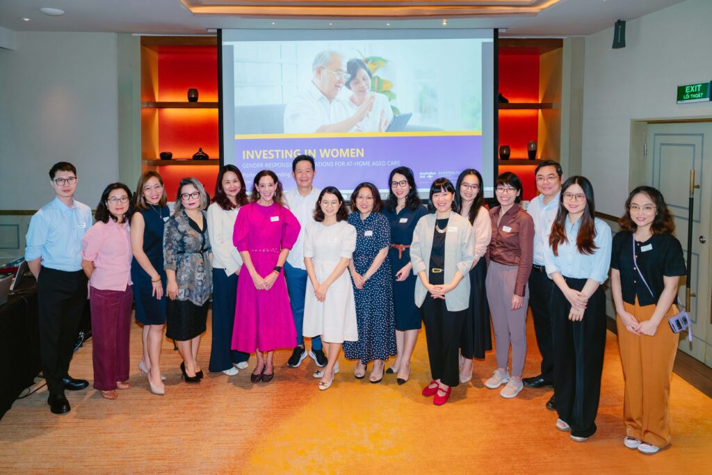 all participants taking a group photo at a workshop